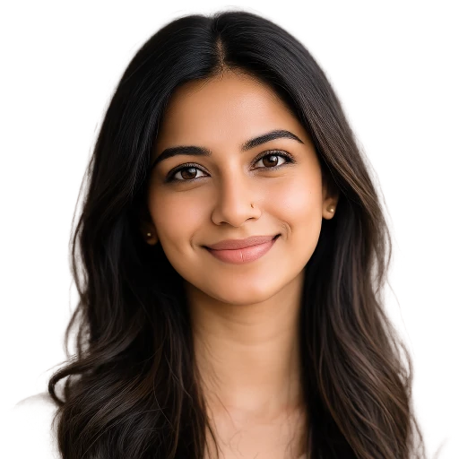 Smiling Indian woman headshot on a light background